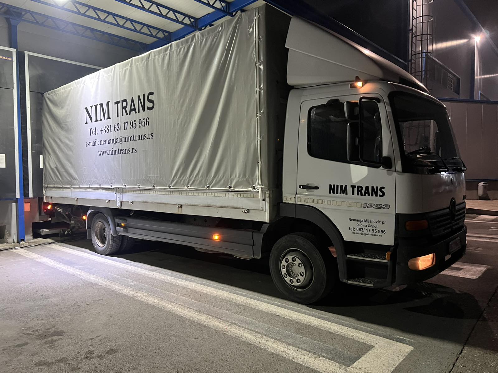 NIM TRANS kamion sa ceradom za transport robe